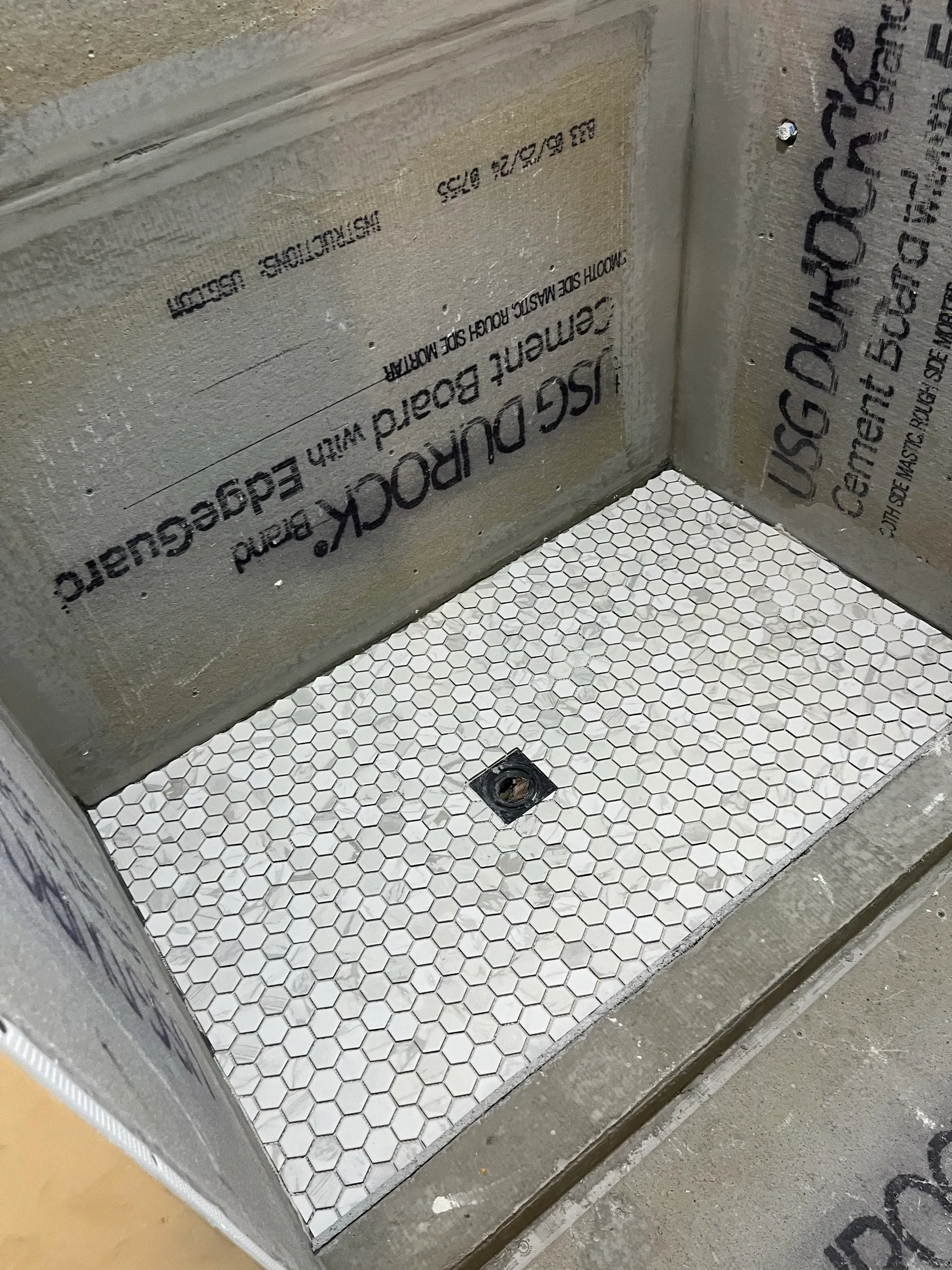 Hex mosaic shower floor